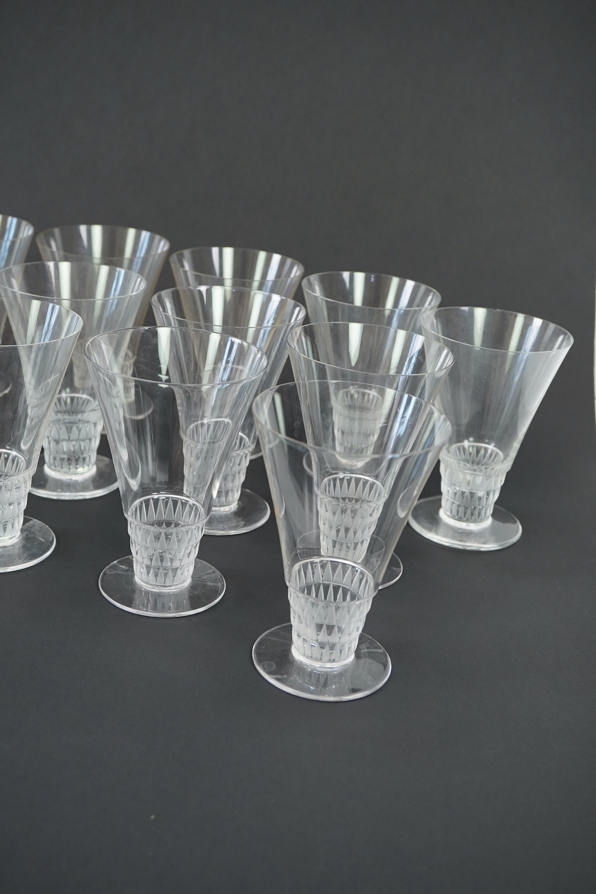 Lalique: A suite of 'Bourgueil' pattern drinking glasses